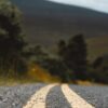 An empty road with two white lines painted on it