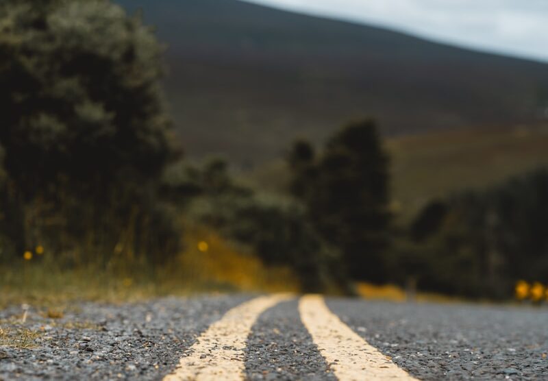 An empty road with two white lines painted on it